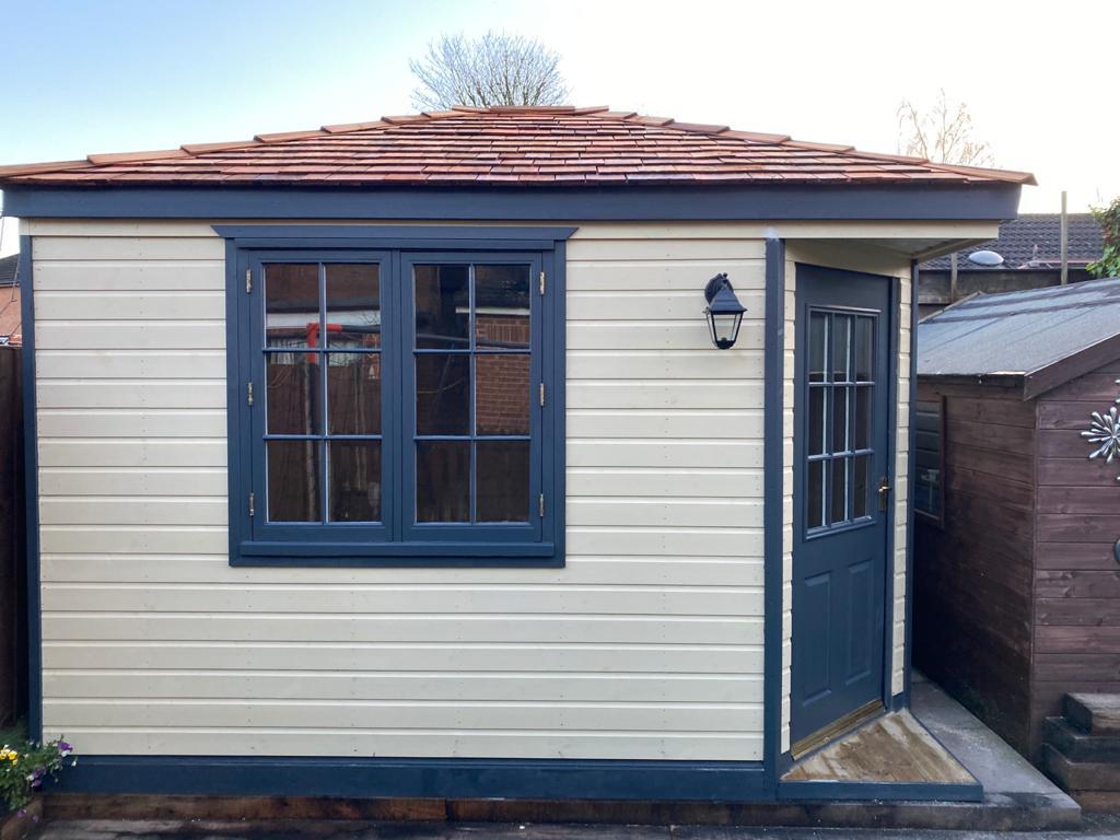 Small garden room with angled front door