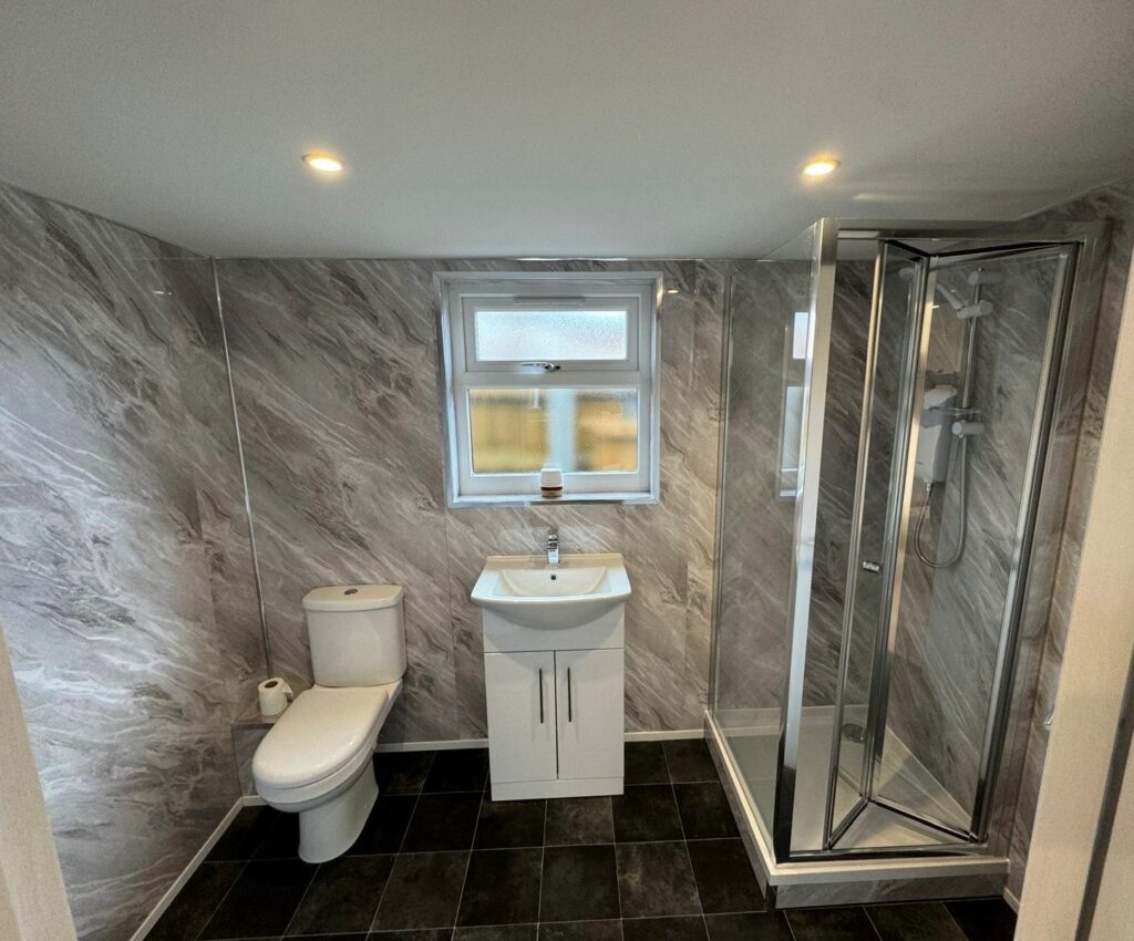 Toilet facilities inside garden annexe build